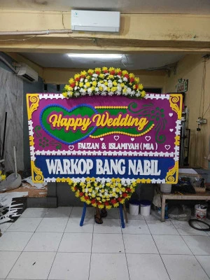 Papan Bunga di Taman Menteng